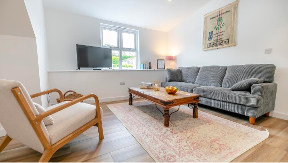 Living room with sofas and coffee table — Apartment 9