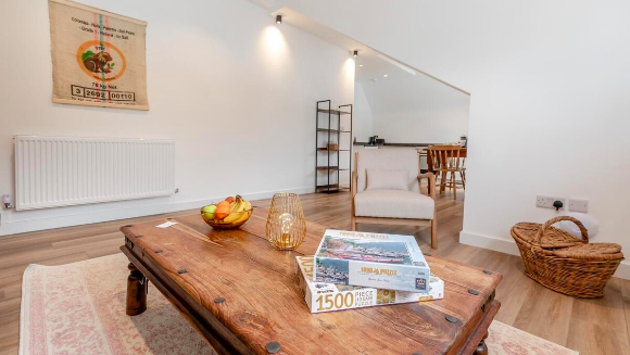 Coffee table and open-plan living space — Apartment 9