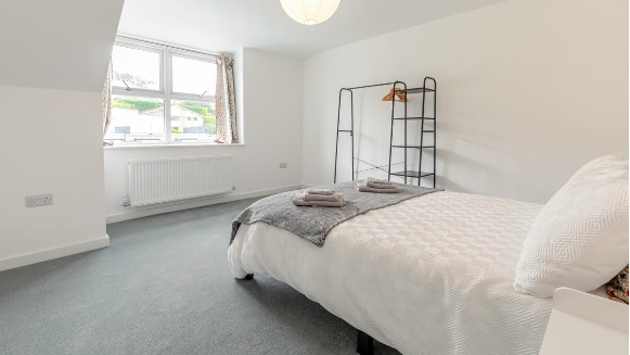 Bedroom with clothes storage — Apartment 9