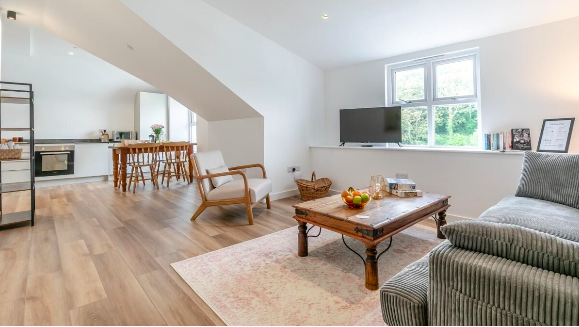 Open-plan living and dining area — Apartment 9